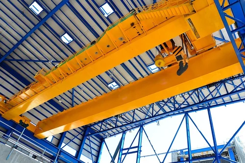 Heavy duty overhead crane inside manufacturing bay